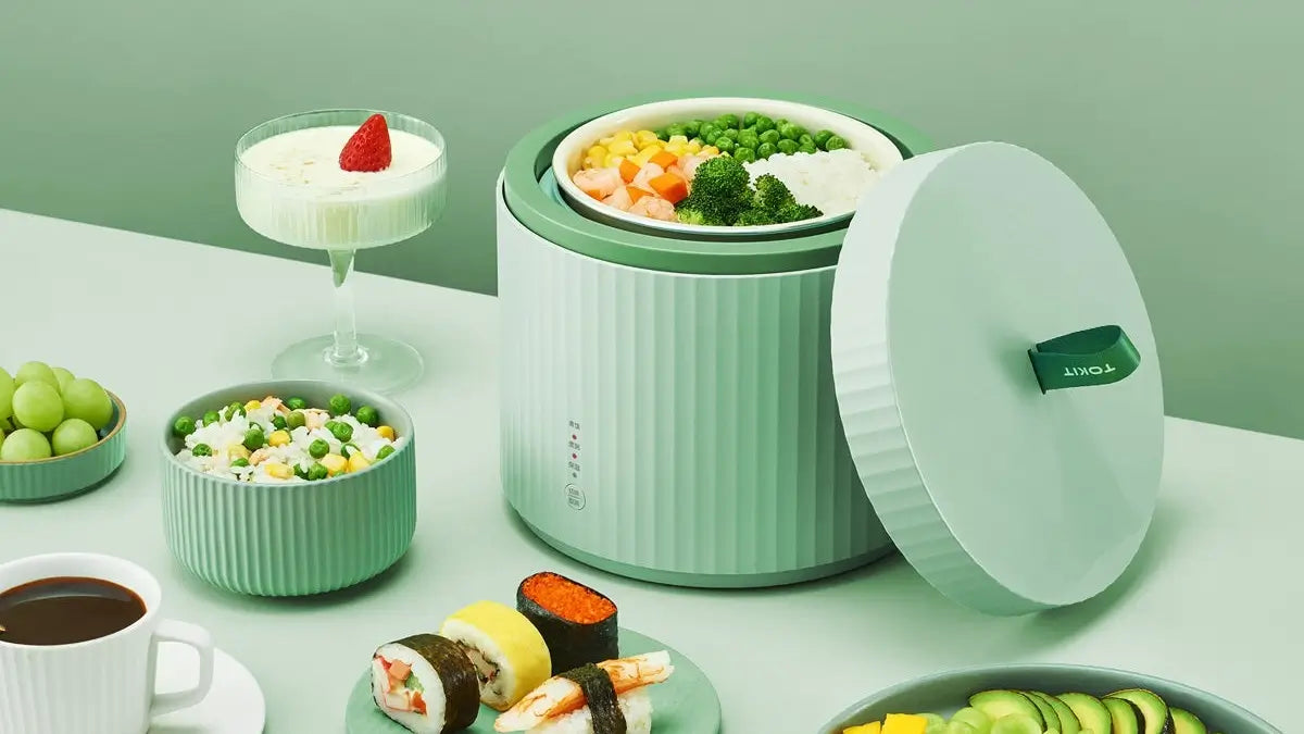 Groene Xiaomi Tokit Pat rijstkoker van 1,5 liter met Aziatische gerechten, desserts en groenten